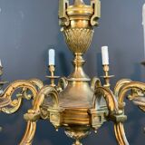 Important Louis XVI style chiseled bronze chandelier with 8 light arms by Lucien Gau