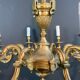 Important bronze chiseled chandelier in Louis XVI style with 8 light arms by Lucien Gau.