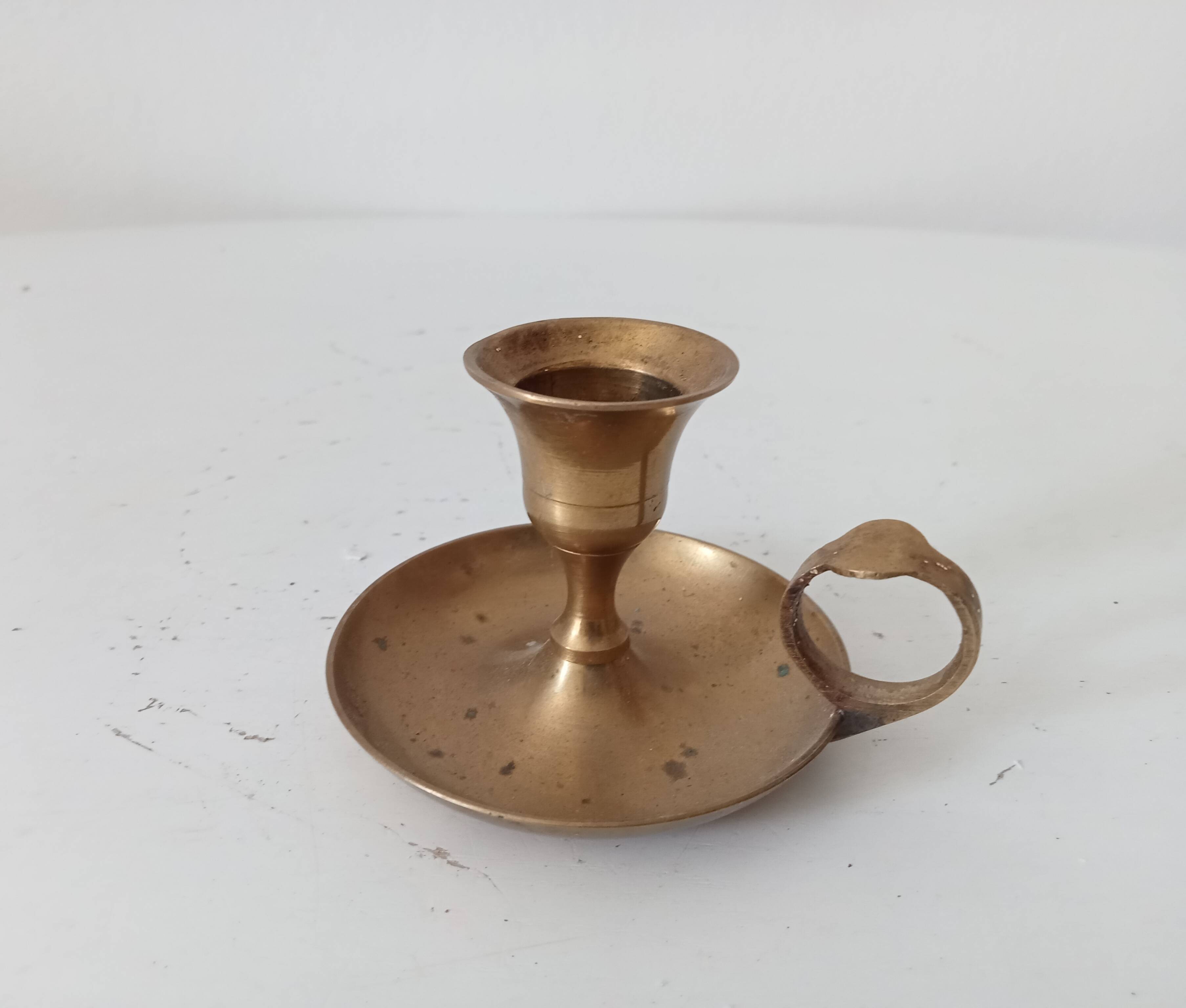 Vintage brass hand candle holder