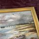 Tableau paysage maritime avec barque, signé Stauzin