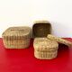 Vintage trio of small rattan nesting baskets