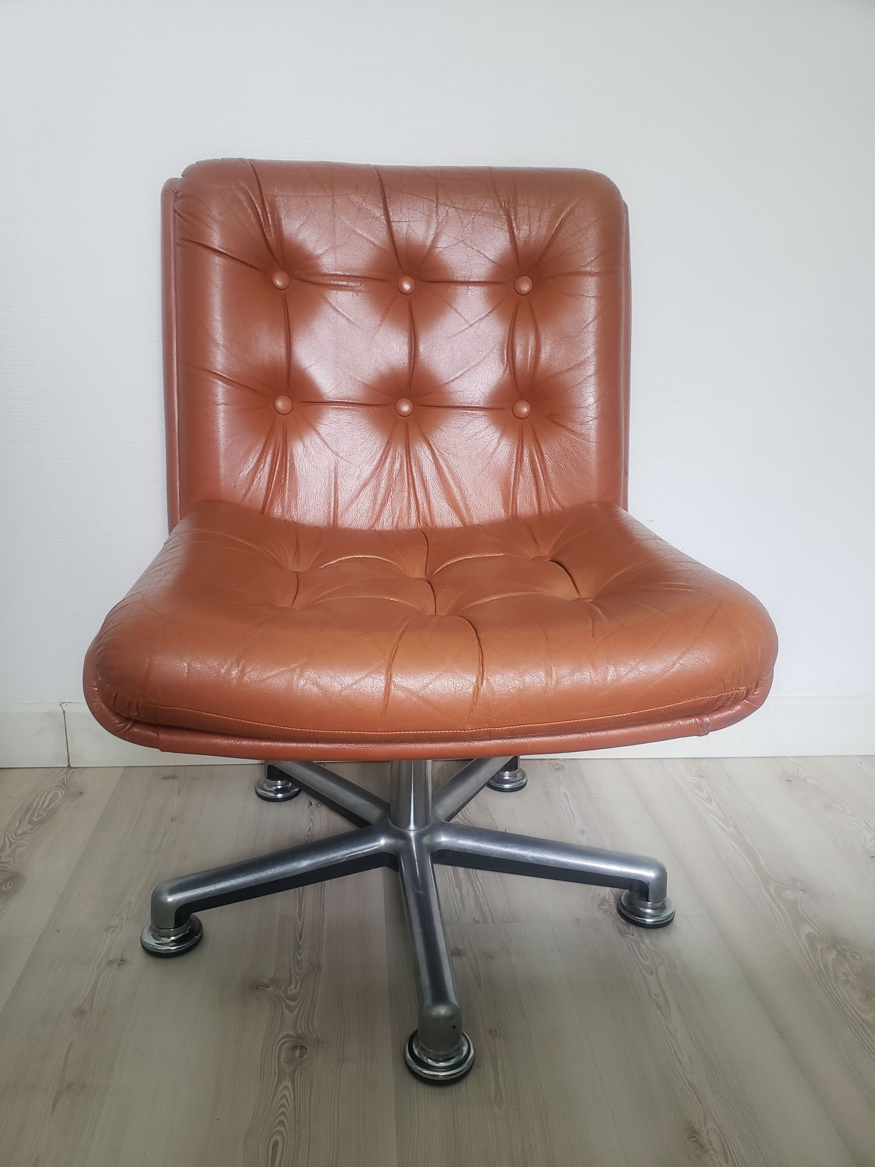 Vintage armchair in brown leather