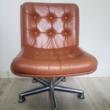Vintage armchair in brown leather