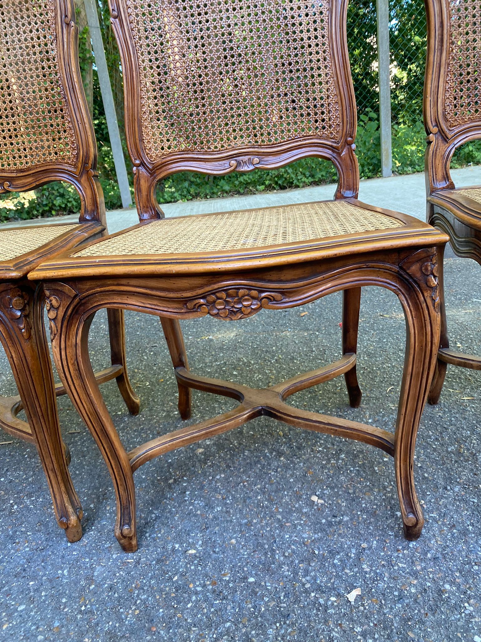 2 Louis XV style chairs in solid oak with rush seating from La Meublerie Meulin.