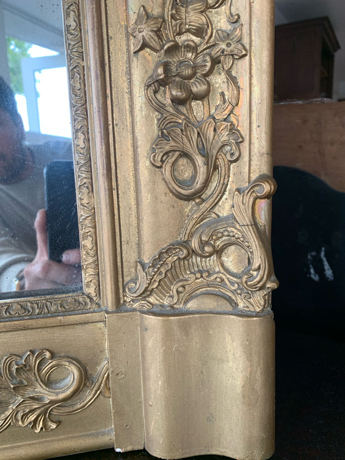 Old gilded mirror fireplace, 19th century restoration