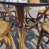 Rattan dining table and its 4 matching chairs