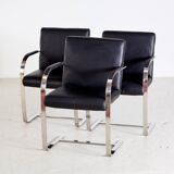 Steel armchair with leather upholstery