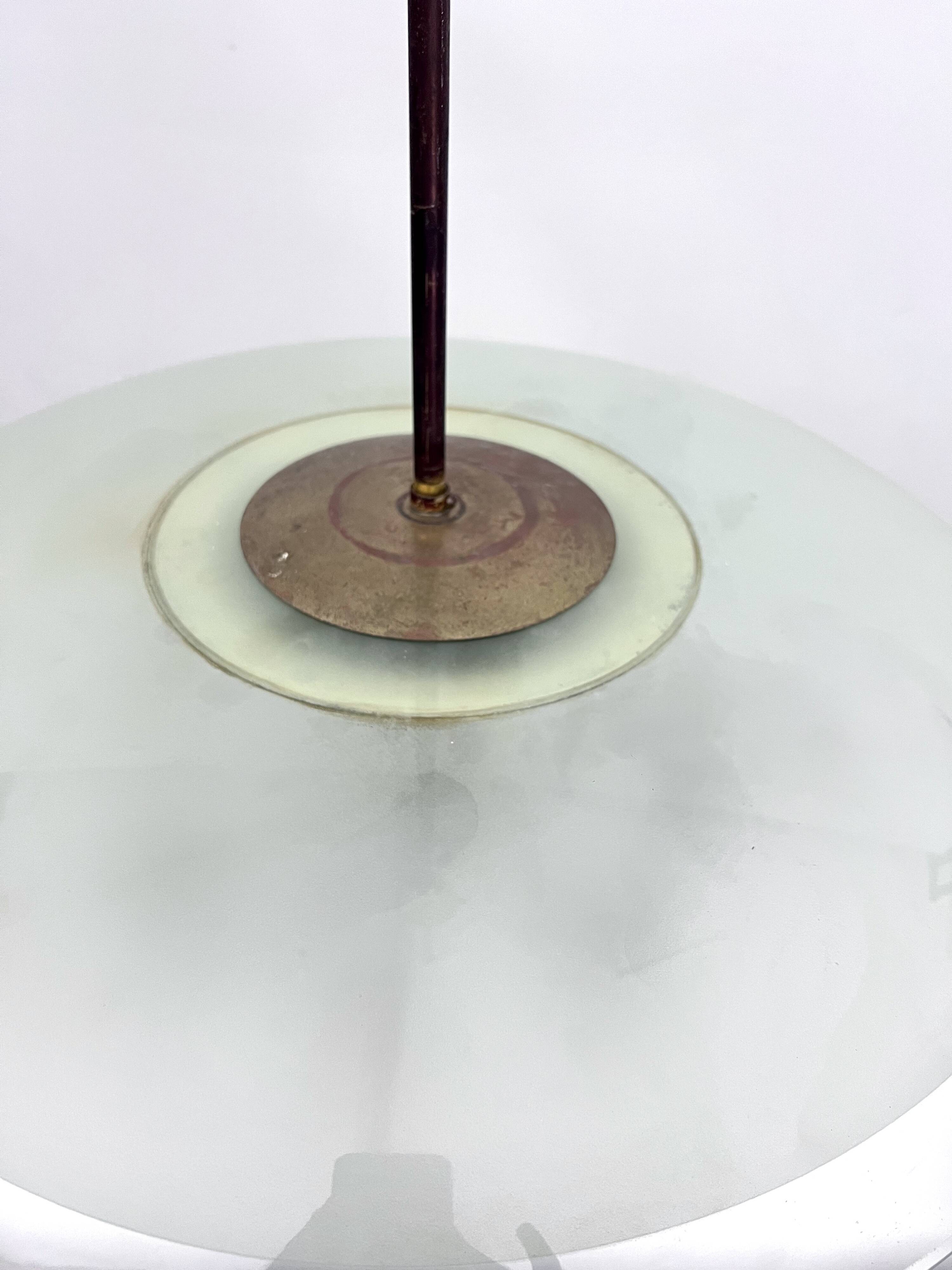 Curved glass disk chandelier. Italy 1950s