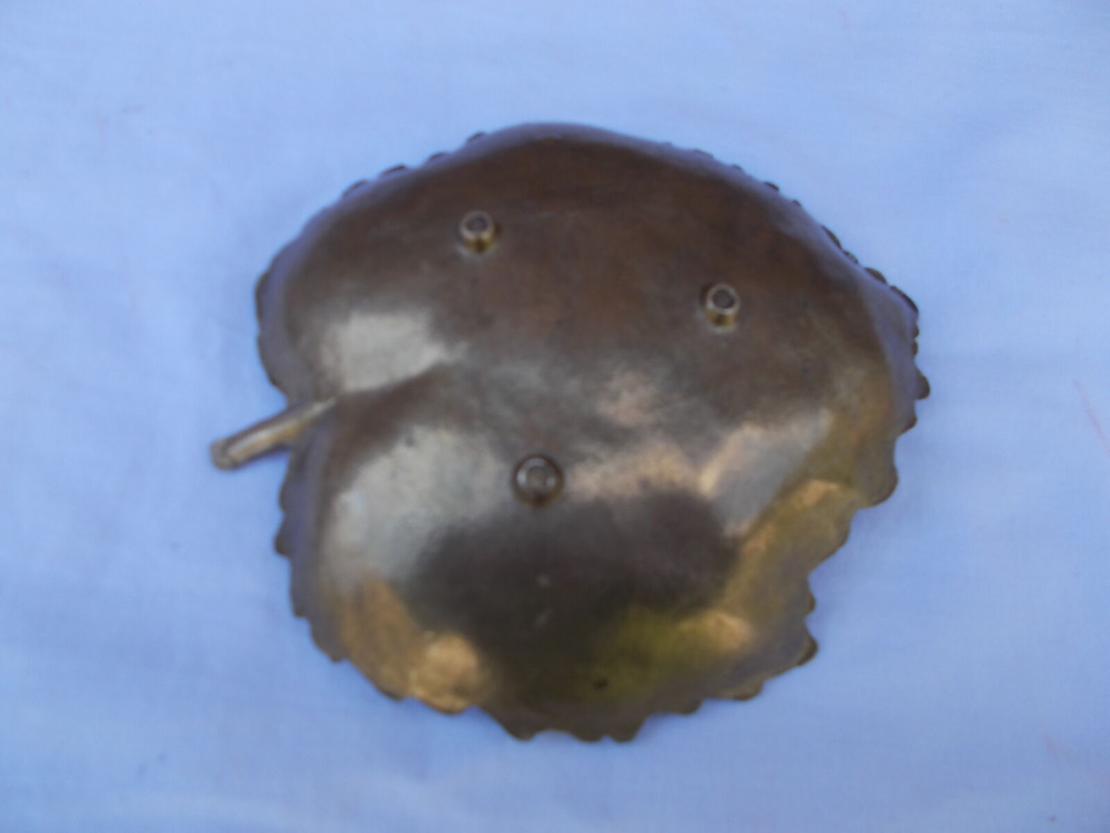 Empty-pocket sheet in brass