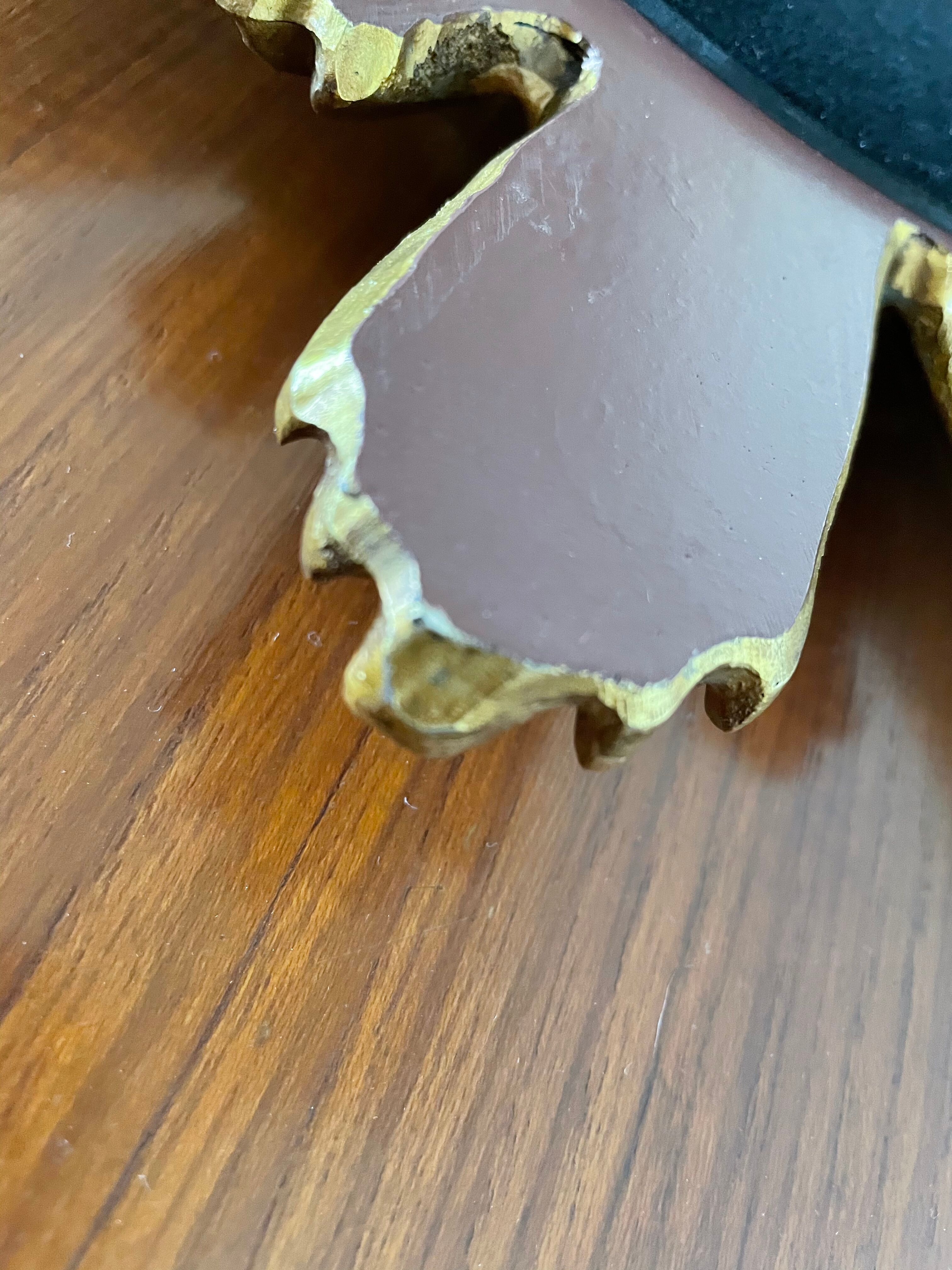 Vintage sun mirror in 60s/70s gold resin