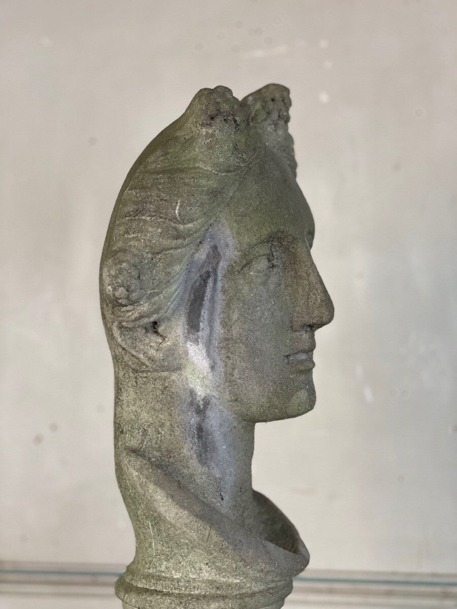 Female bust sculpted in stone