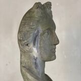 Female bust sculpted in stone