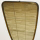 Asymmetrical mirror from the 60s