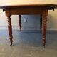 Round table with antique flaps