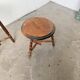 Set of 4 turned oak stools.