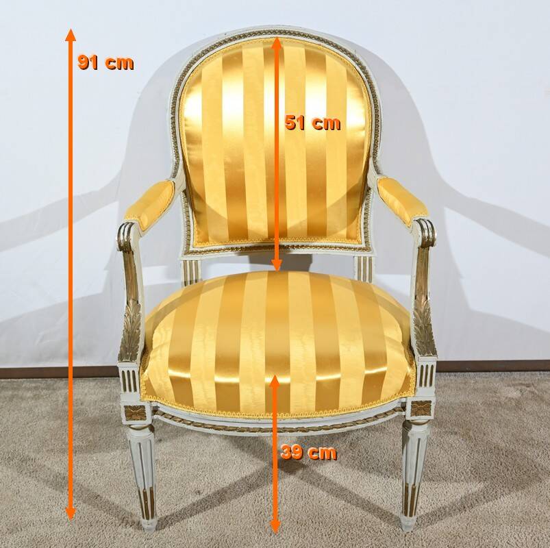 Pair of Cabriolet Armchairs, in rechampi wood, Louis XVI style – Late 19th century