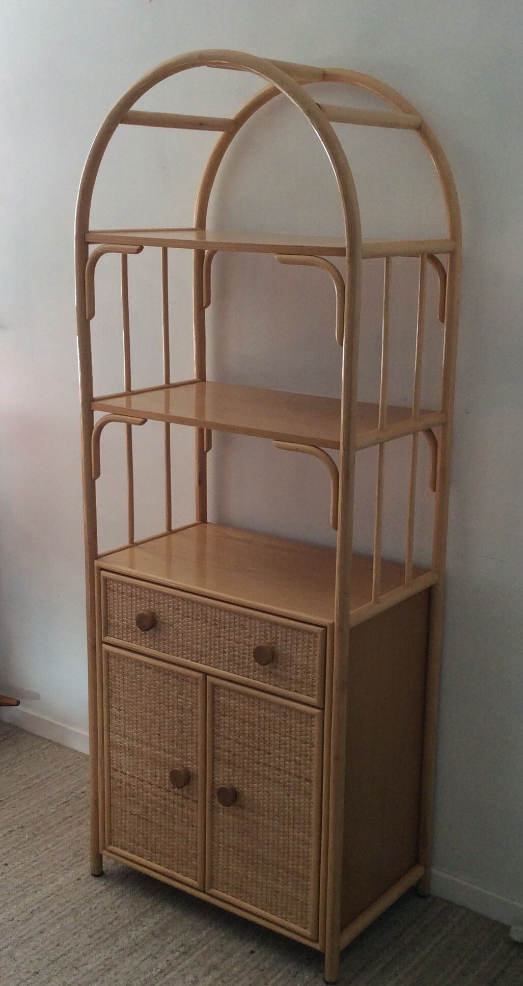 Shelf of the 70s in rattan and wicker wood