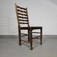 Ensemble de 4 chaises de salle à manger en chêne, rustiques, de ferme, à dossier en échelle avec sièges en jonc, années 1960