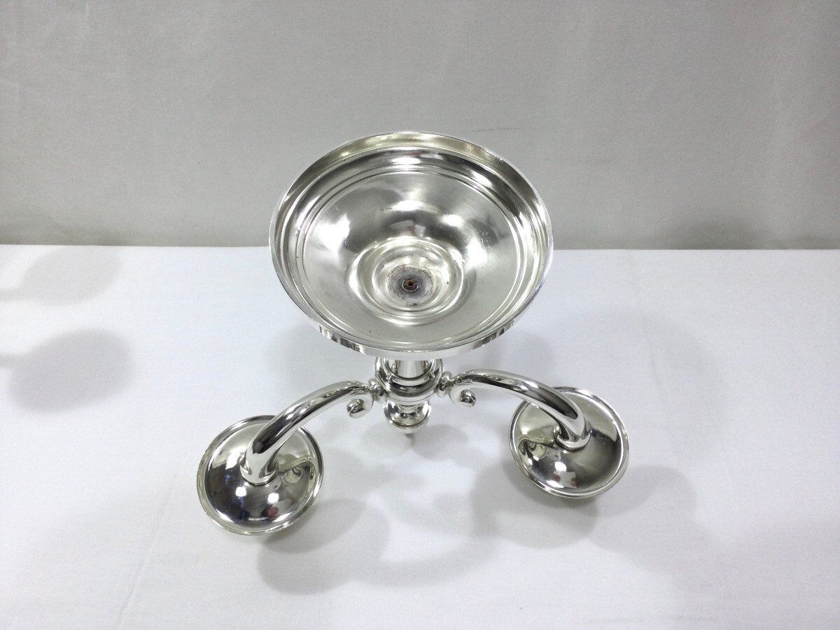 Pair of silver bronze candelabras