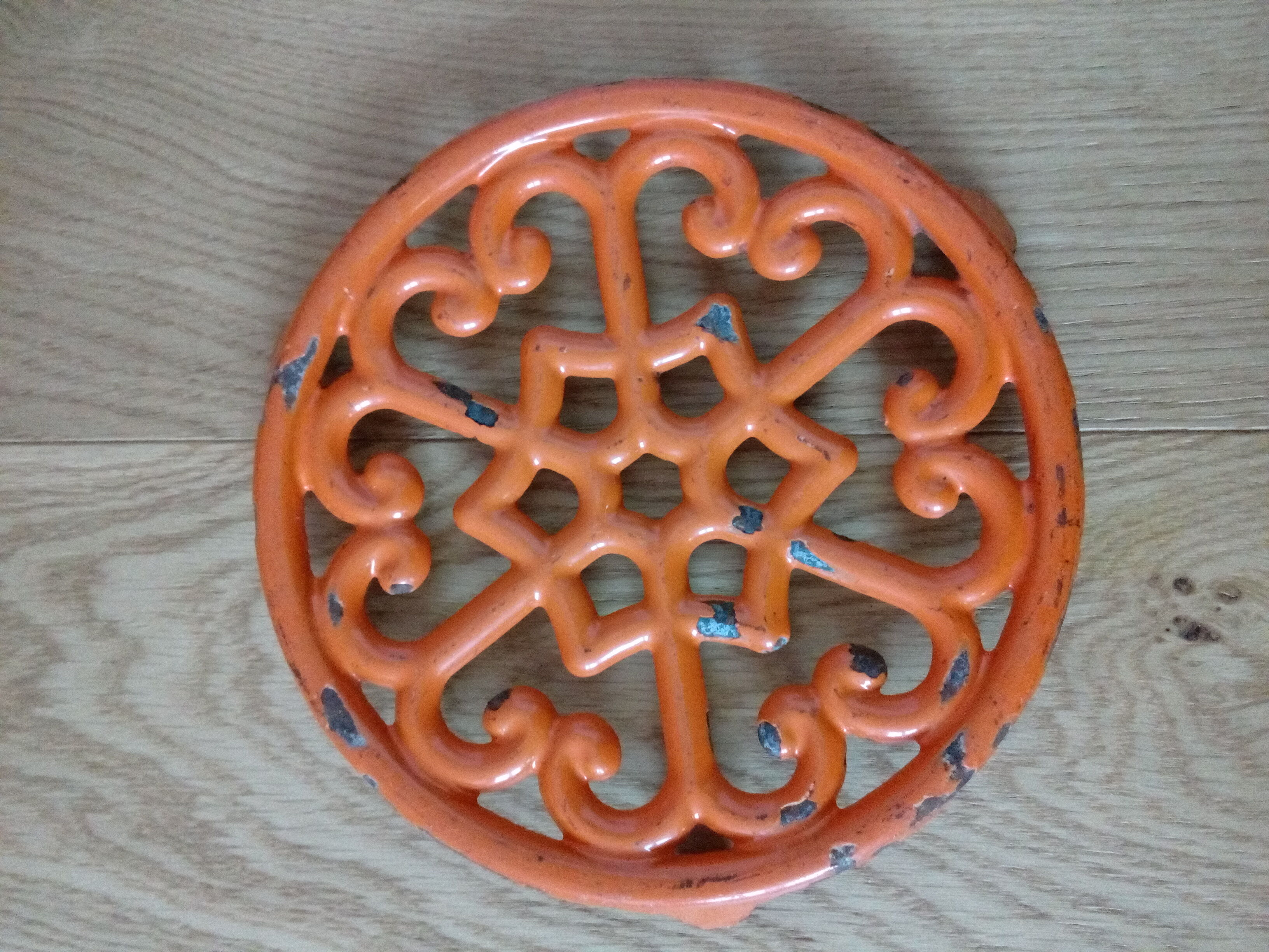 Orange enamelled cast iron dish