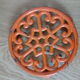Orange enamelled cast iron dish