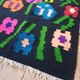 Kilim de laine florale, fond noir avec des fleurs colorées, réversible, Roumanie tissée à la main 235 x 160 cm