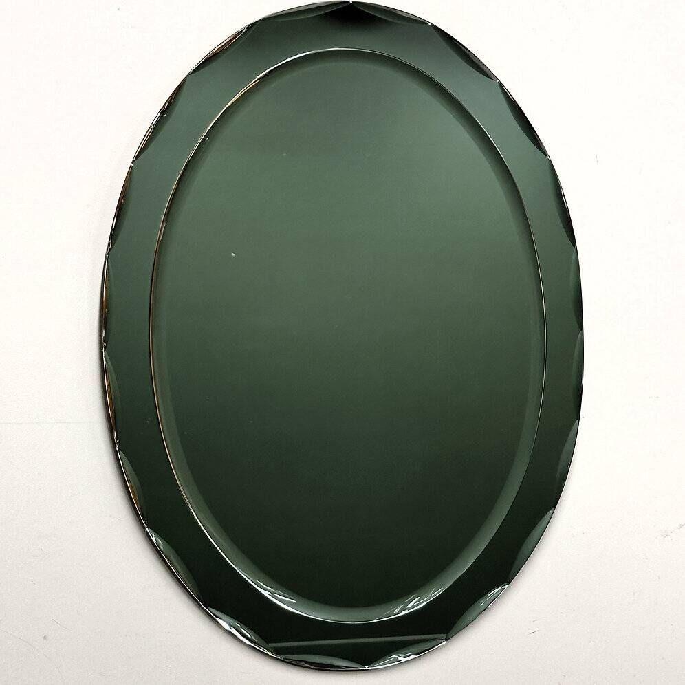 1970s Italian oval mirror by Crystal Arte with faceted glass frame