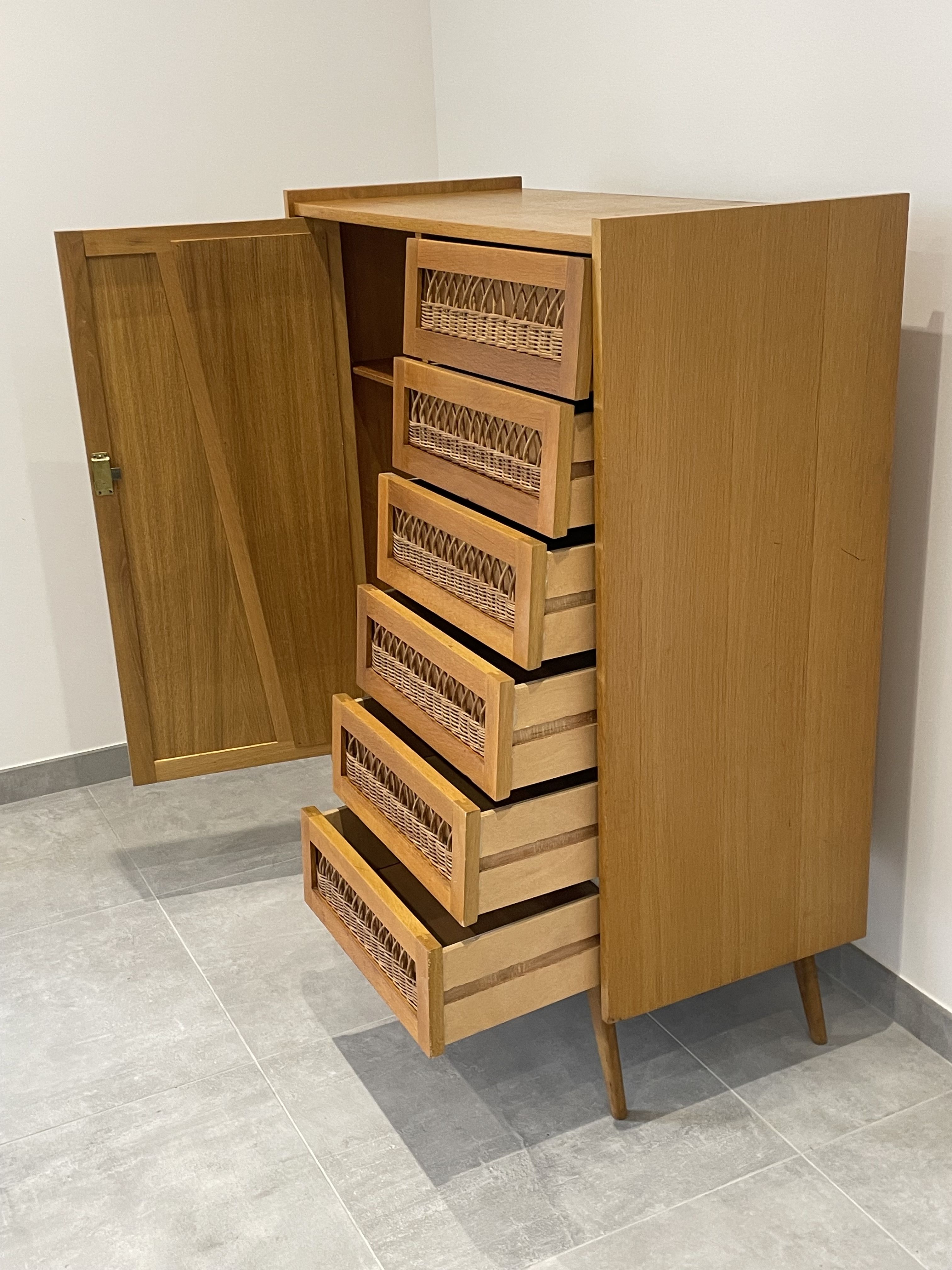 Children's wardrobe in wood and rattan with so-called Parisian compass feet