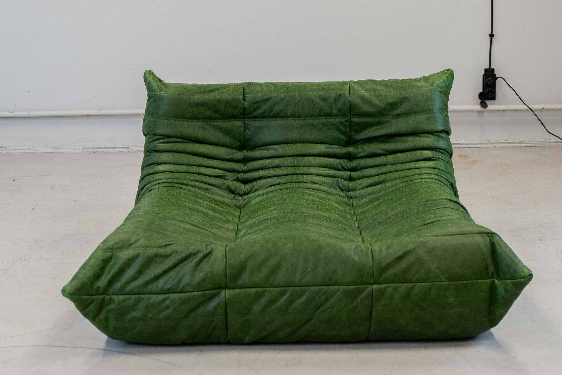 Togo chaise lounge in green leather attributed to Michel Ducaroy for Ligne Roset, 1974