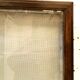 Wall display case with a solid oak door