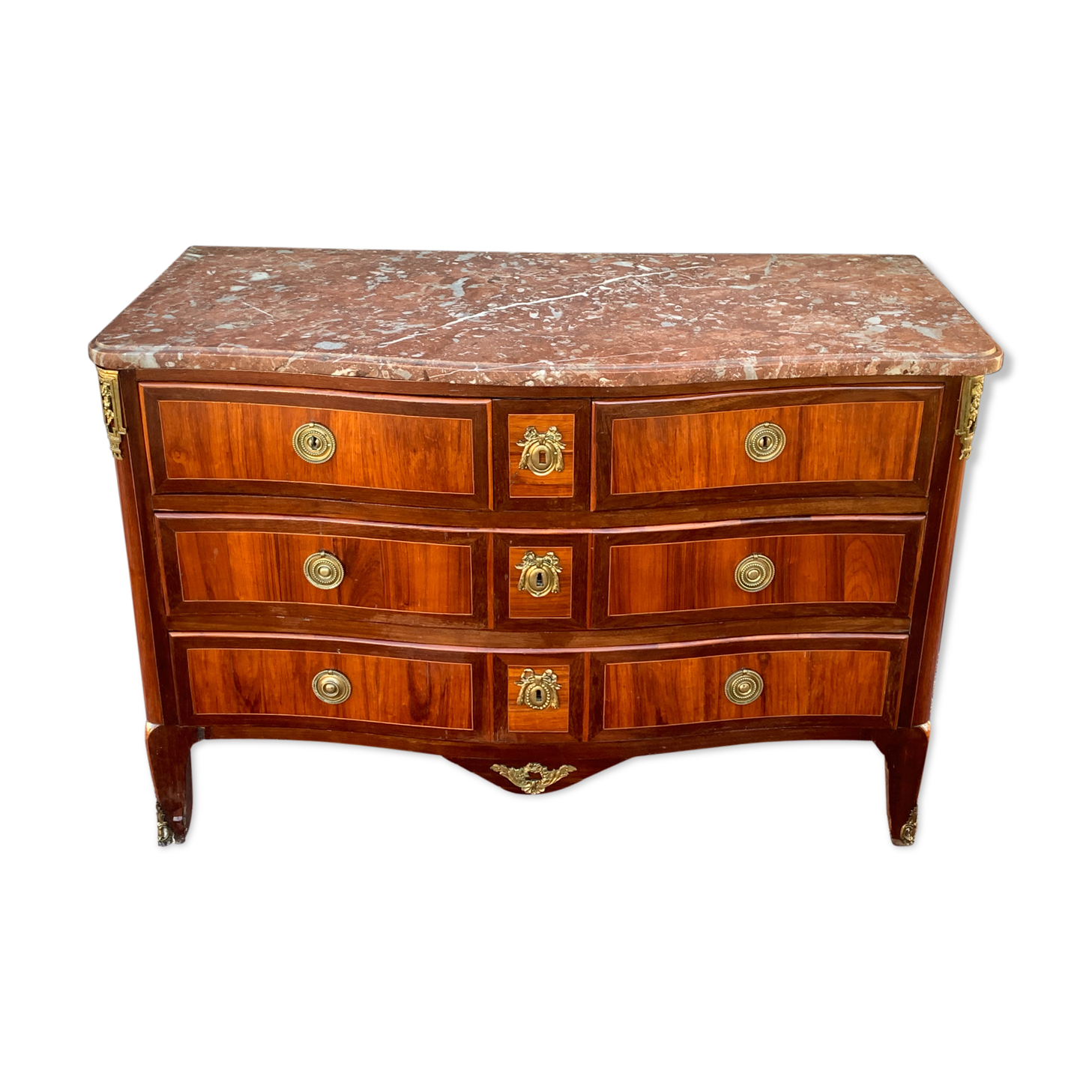 Commode galbée en marqueterie d’époque transition