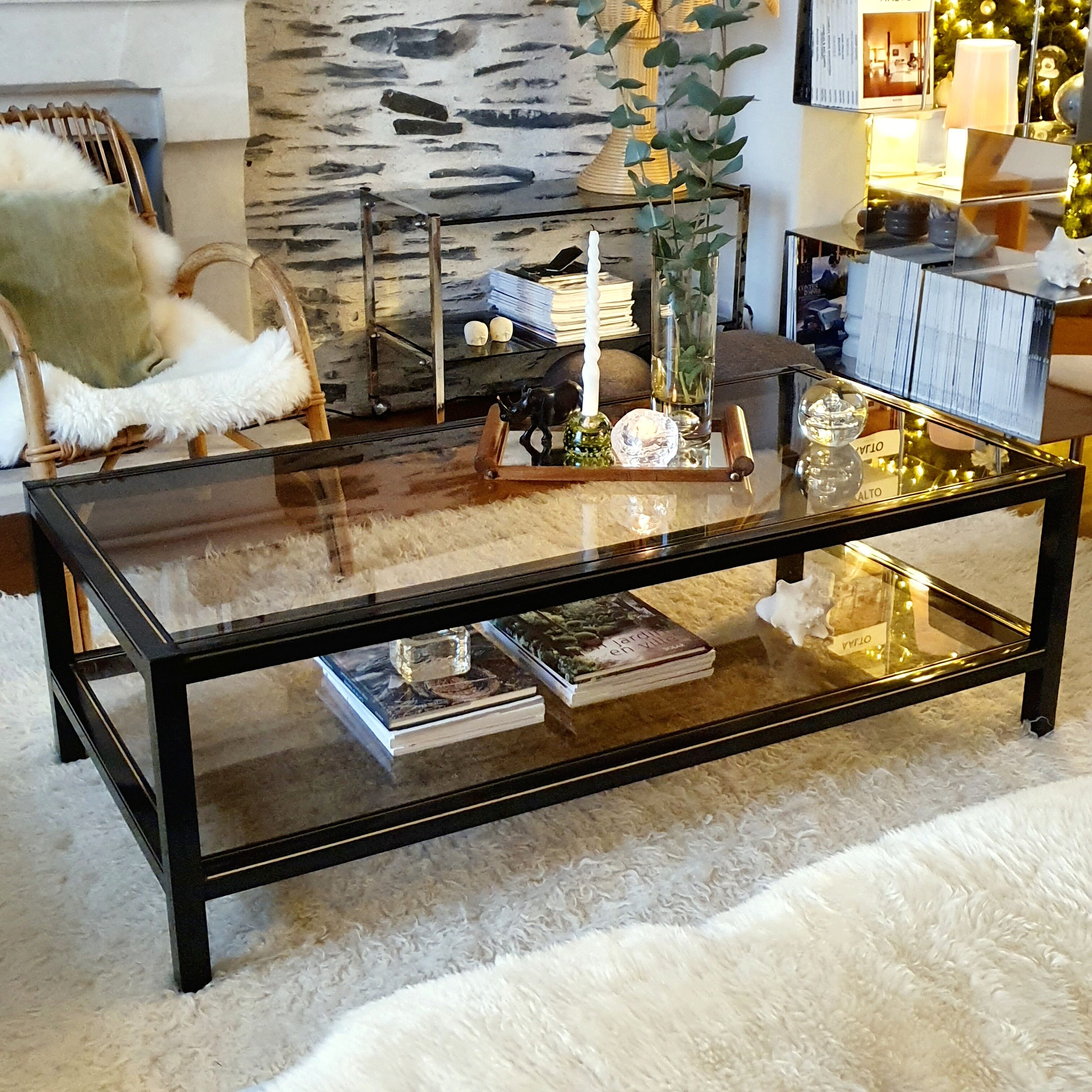Black and gold coffee table with a double smoked glass top