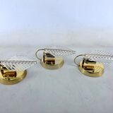 Vintage set of three sconces in brass and glass by Zero Quattro. Italy 1970s