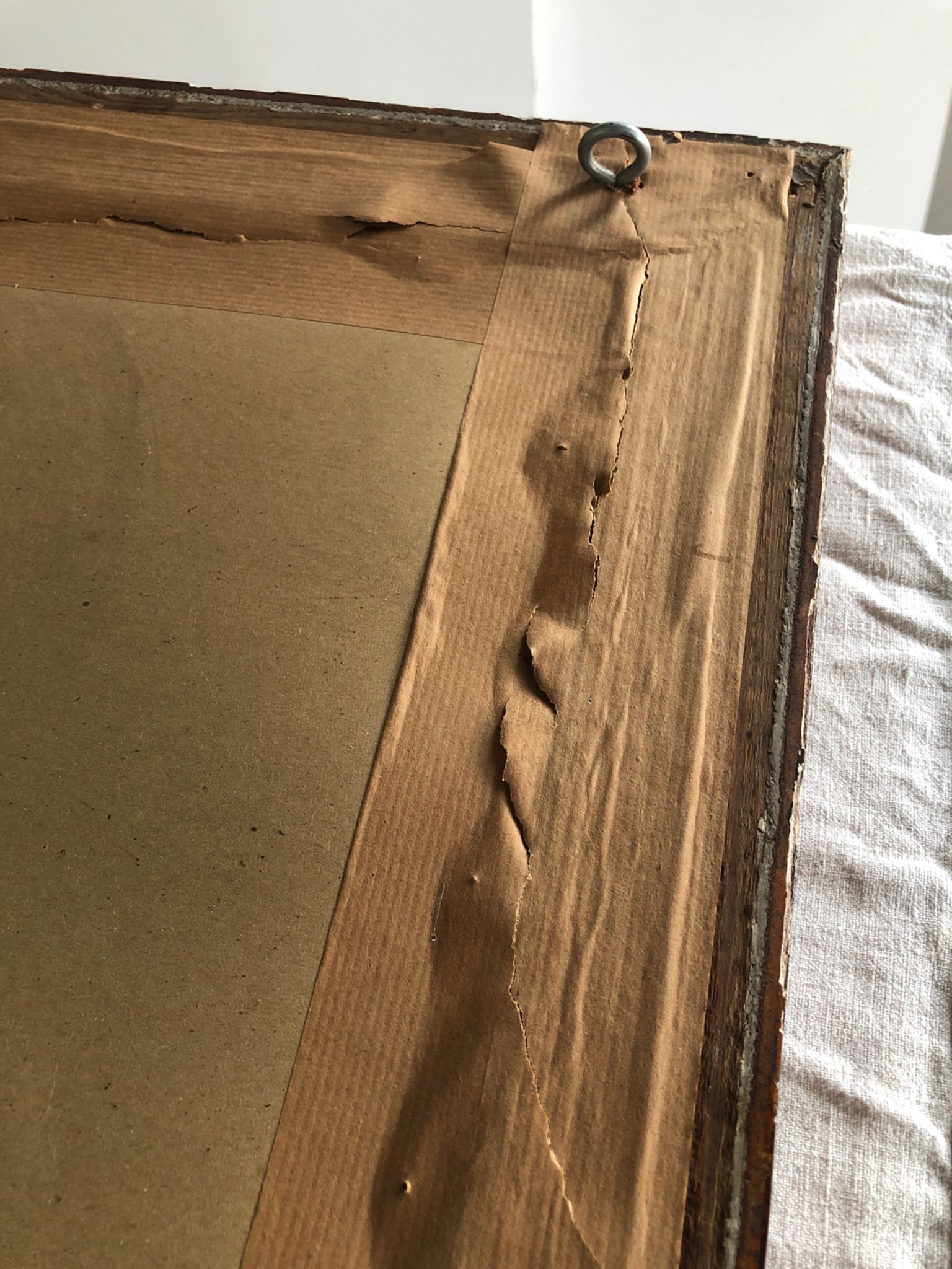 Old mirror with wooden frame and plaster moldings