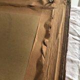 Old mirror with wooden frame and plaster moldings