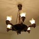Large Art Deco sculptural chandelier in bronze and glass, 1930s