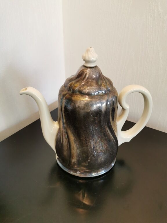 Silver-plated ceramic jug