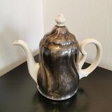 Silver-plated ceramic jug