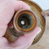 Sandstone candle holder called cellar rat