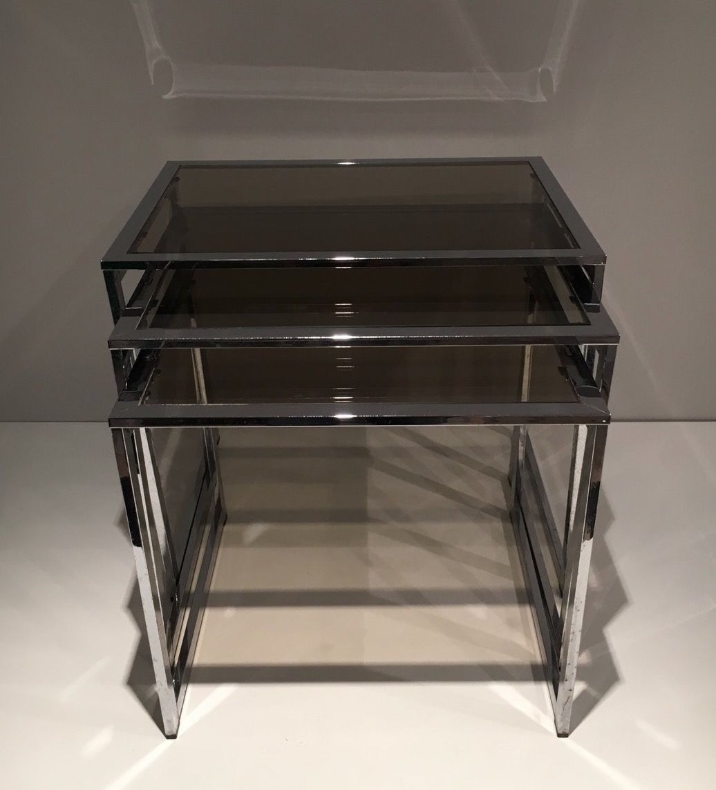 Set of 3 chrome nesting tables. Around 1970.
