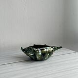 Green shell-shaped ashtray.