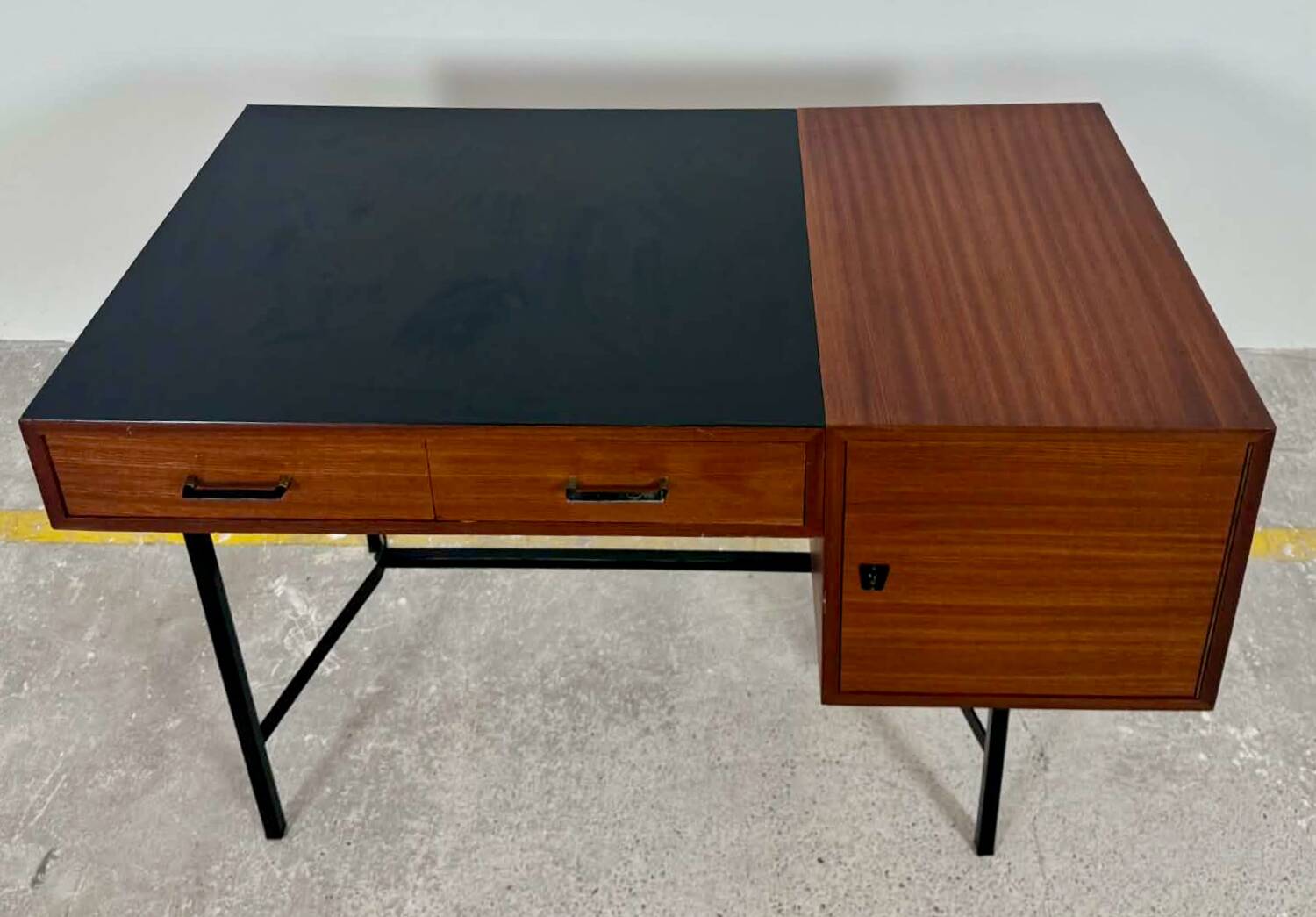 French modernist desk from the 1950s with 2 drawers, 1 cabinet, and 1 container.
