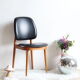 Suite of 6 Chairs Baumann model Pegasus in beech and faux black leather