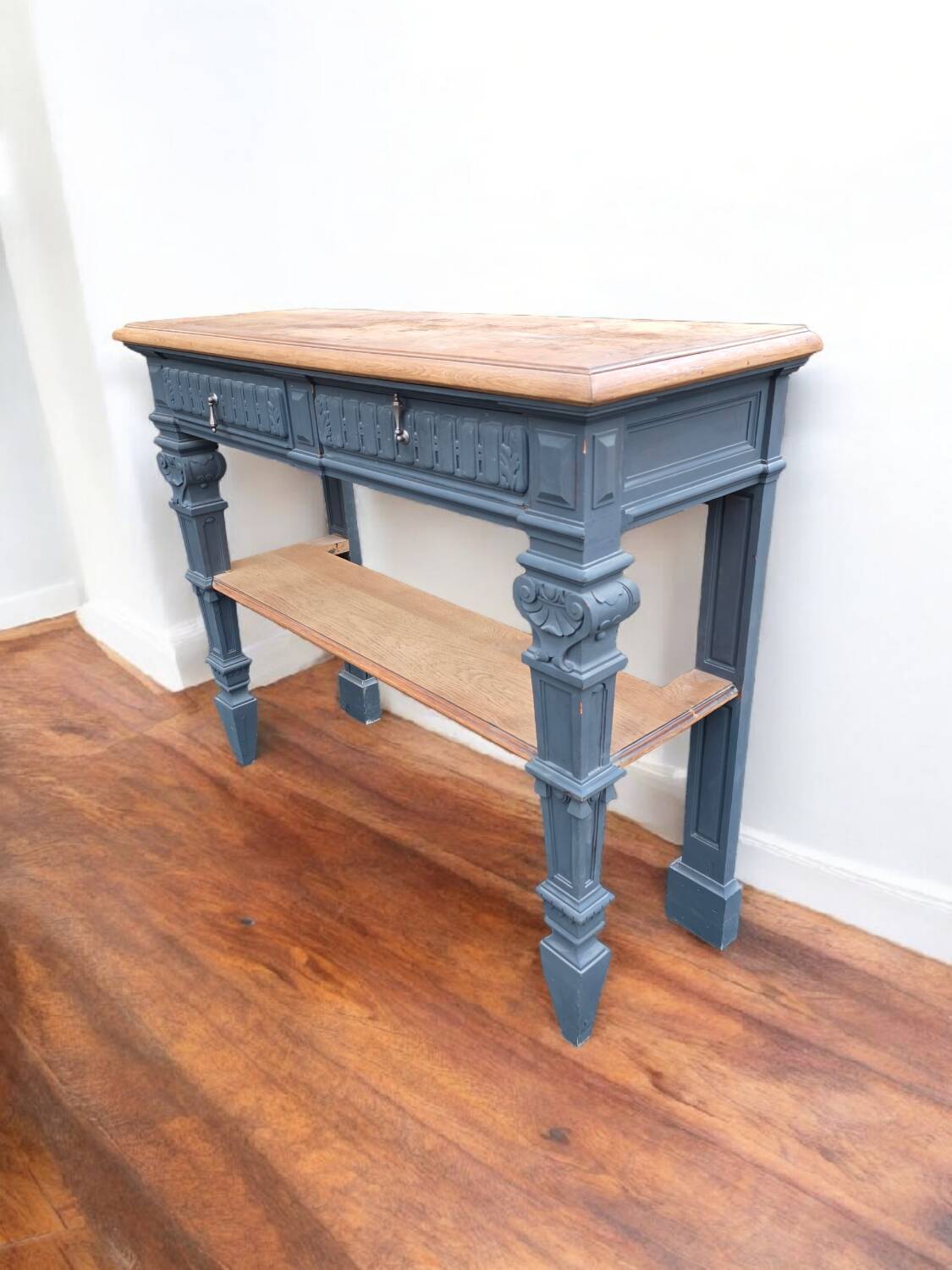 Console in patinated solid oak, late 19th century.