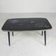 Vintage coffee table with glass top and angled legs