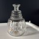 Vintage glass carafe with floral decoration