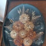 3 frames of dried flowers in curved glass