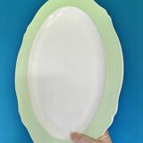 Oval serving dish in earthenware.