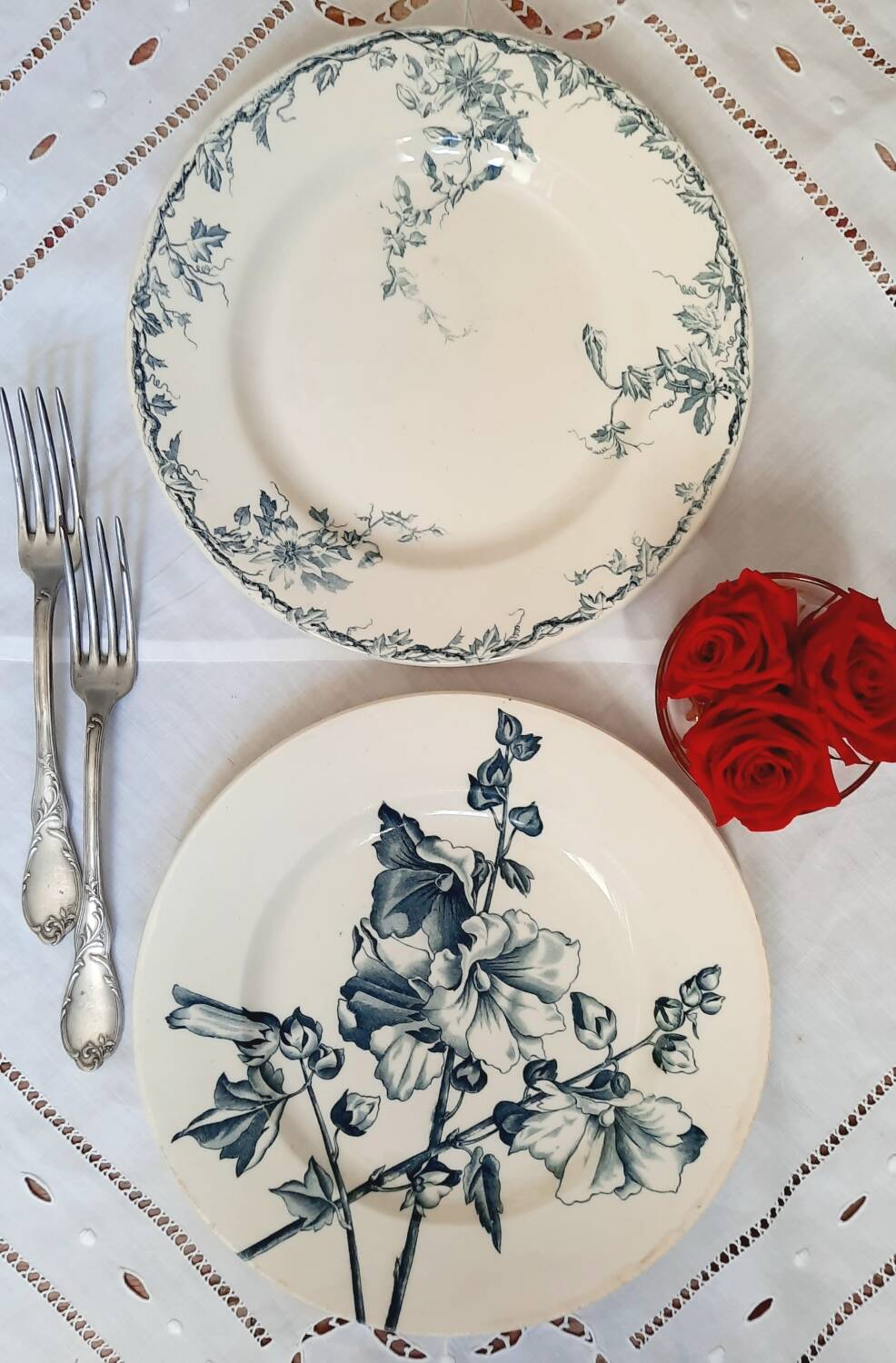 Old mismatched dinner plates accompanied by a dish