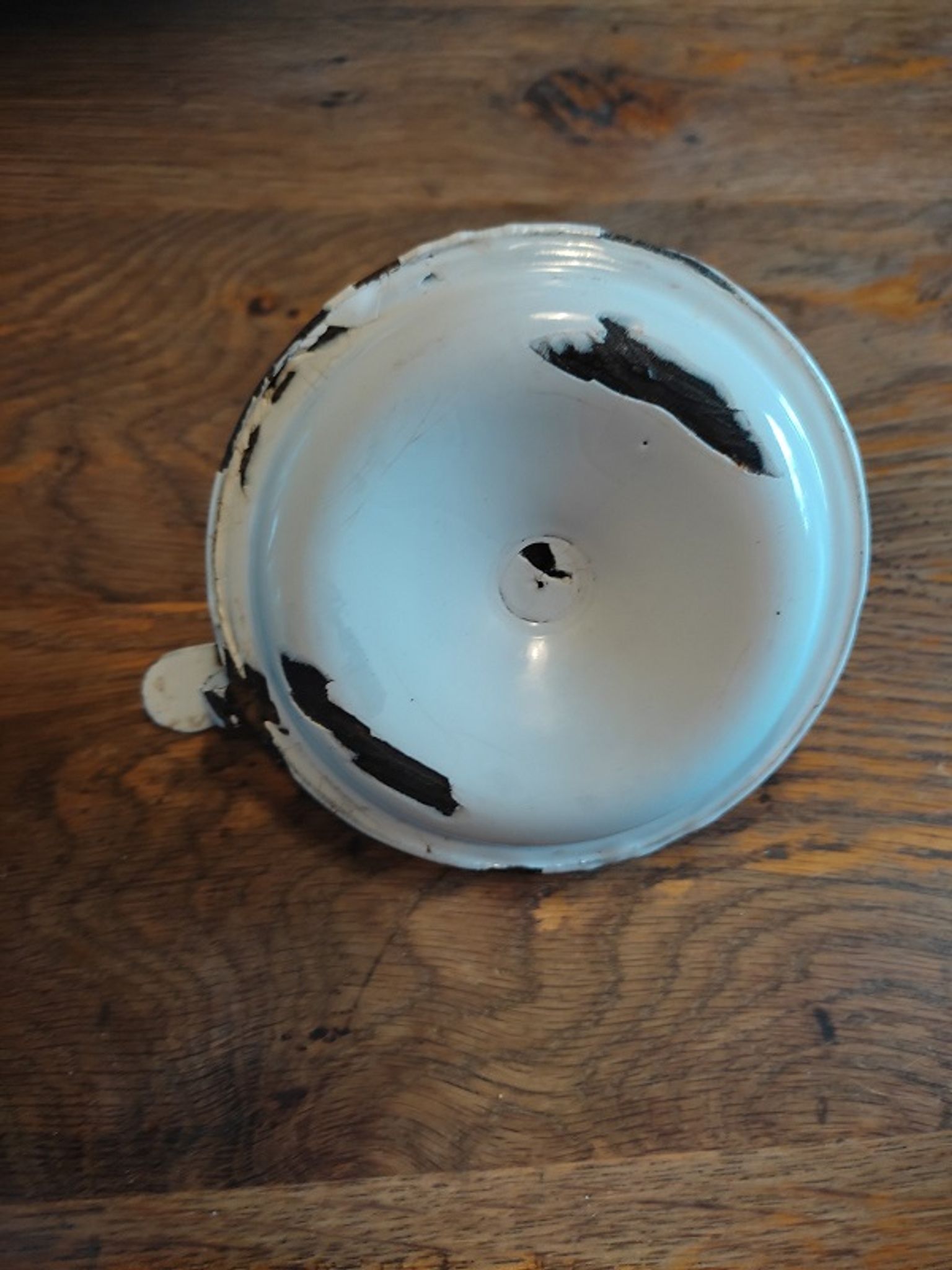 White patinated enamelled metal candle holder
